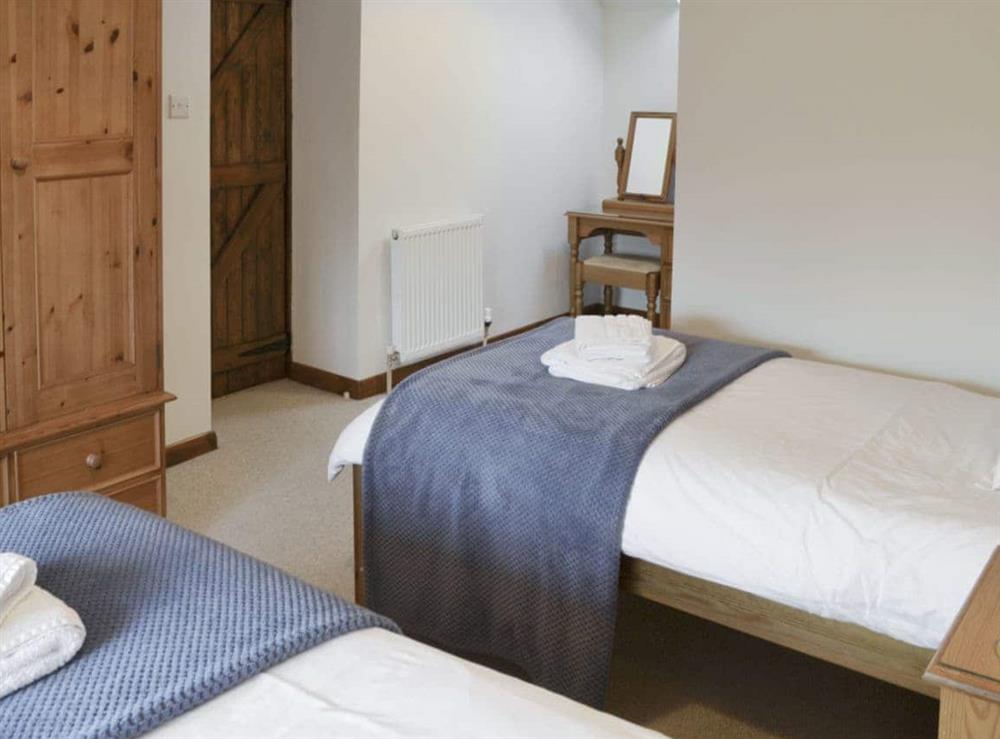 Ample storage and dressing area within twin bedroom at Daisy Cottage in Thornton-le-Dale, N. Yorks., North Yorkshire