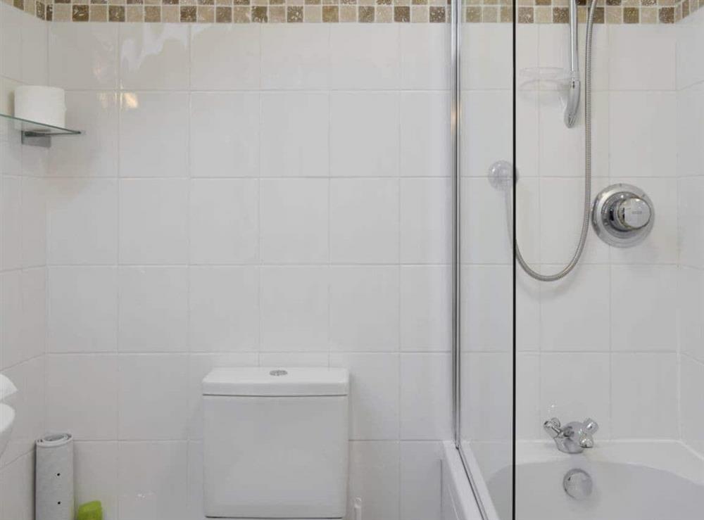 Family bathroom with shower over bath at Daisy Cottage in Thornton-le-Dale, N. Yorks., North Yorkshire