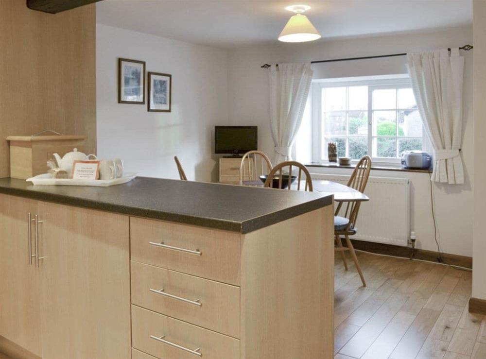 Open aspect from kitchen to dining area at Daisy Cottage in Thornton-le-Dale, N. Yorks., North Yorkshire
