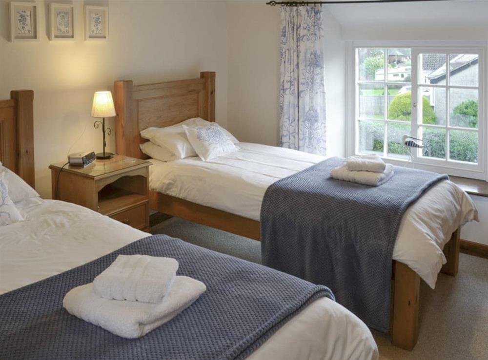 Restful twin bedroom at Daisy Cottage in Thornton-le-Dale, N. Yorks., North Yorkshire