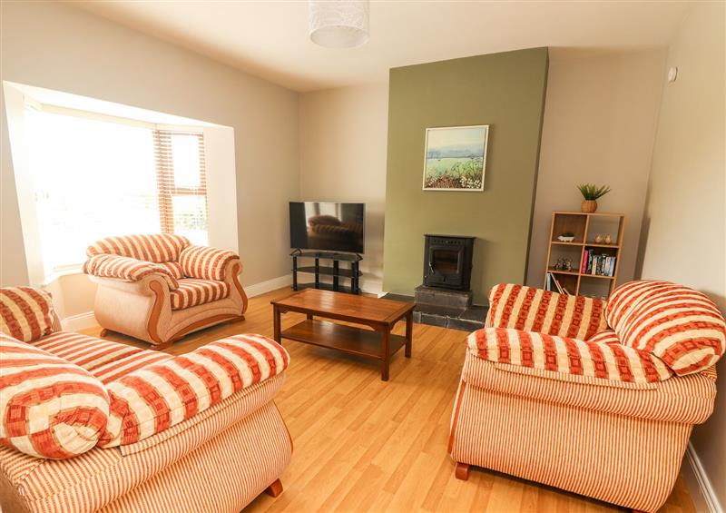 Relax in the living area at Daisys Cottage, Knockreagh near Listowel
