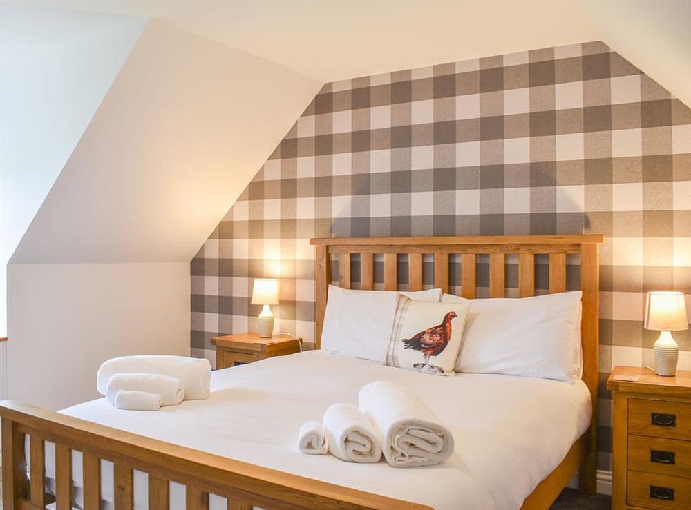 Double bedroom at Dalbuaick Farm Cottages in Carrbridge, Inverness-Shire