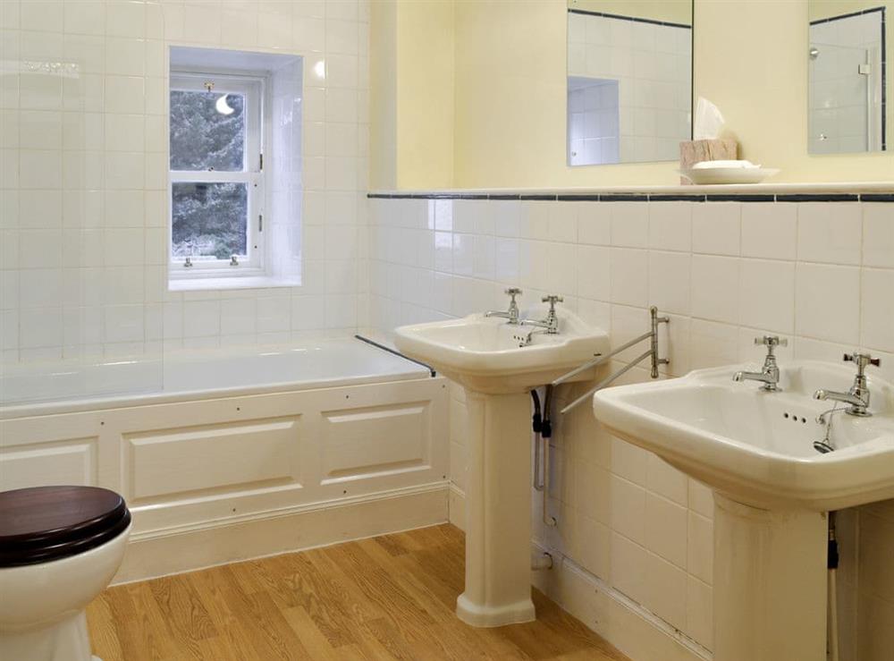 Additional bathroom with shower over bath at Dalnaglar Castle, 