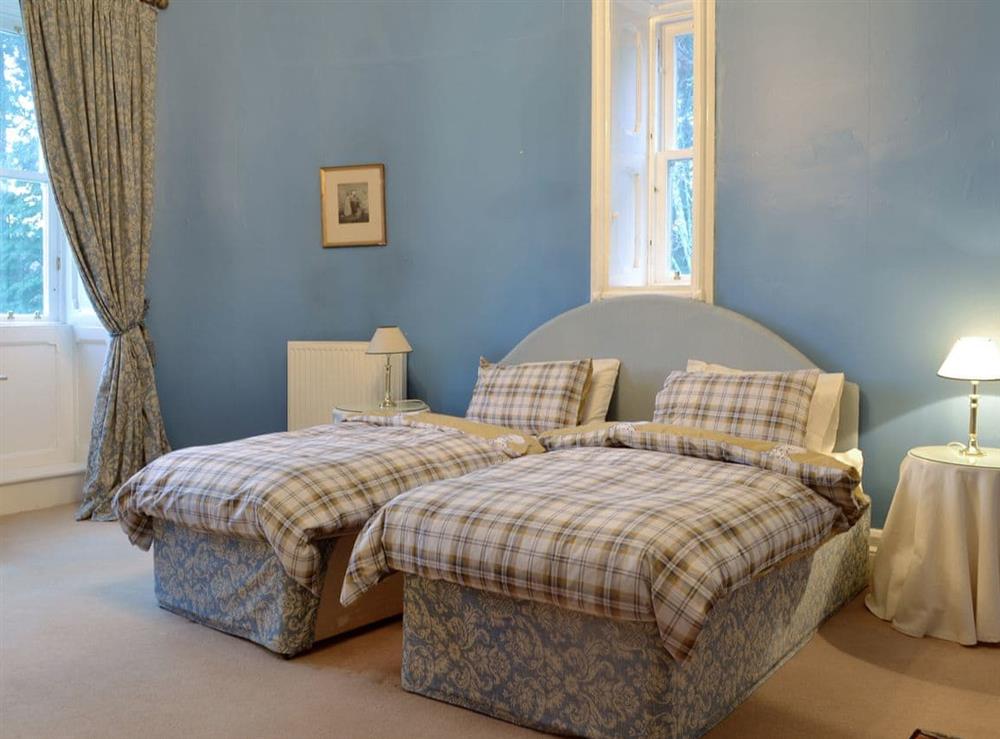 Comfortable en-suite twin bedroom at Dalnaglar Castle, 