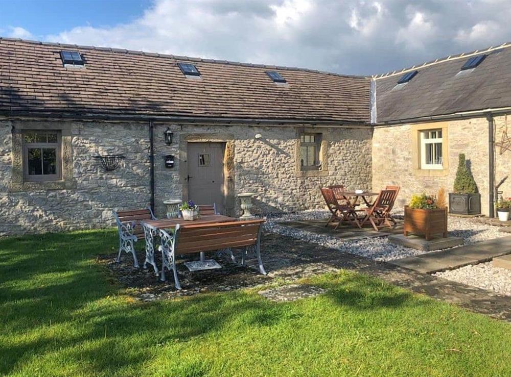 The lovely cottage has a delightful sitting out area at Damsels Bower in Over Haddon, near Bakewell, Derbyshire