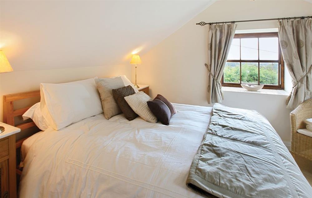 First floor: Master bedroom with 5’ bed and en-suite fully tiled shower room, wc and basin at Damson and Orchard, Rainow
