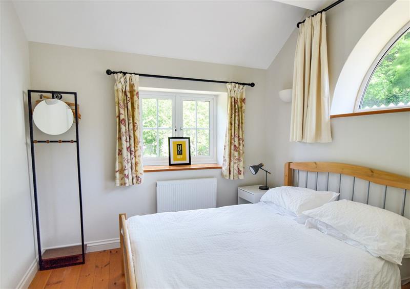This is a bedroom at Damson Tree Cottage, Charmouth