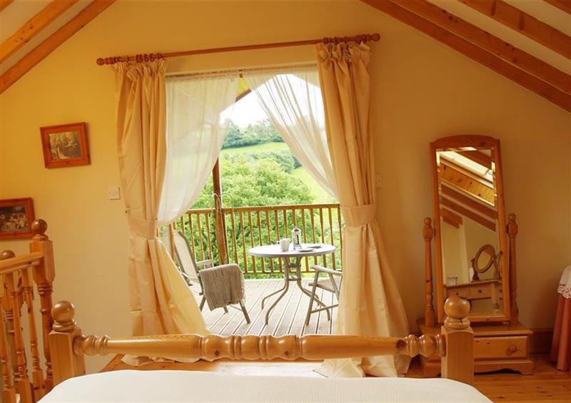 Double bedroom with views at Dan Castell Cottage, Llandeilo, Dyfed