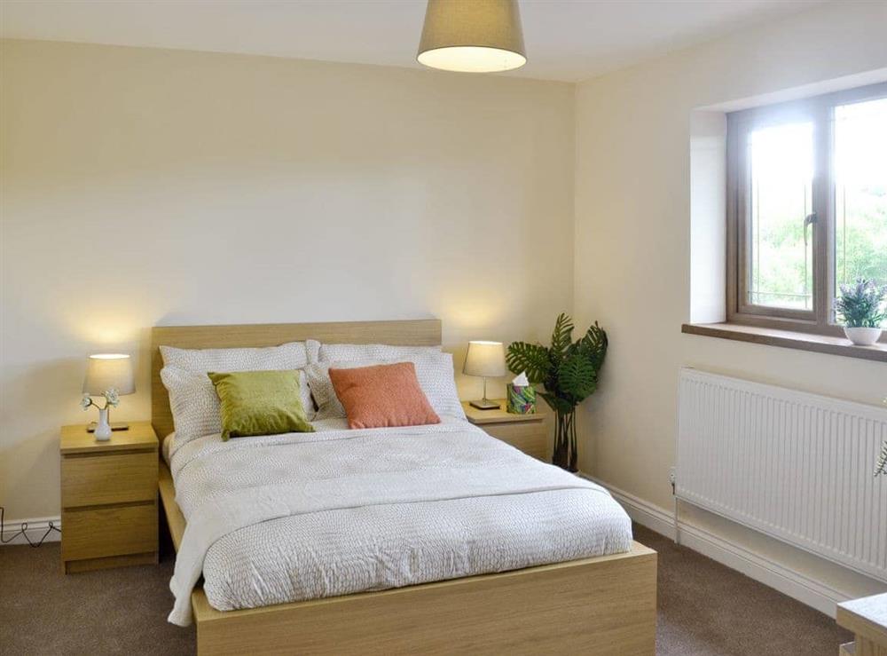 Comfortable double bedroom at Dan-y-Glo in Swansea, West Glamorgan