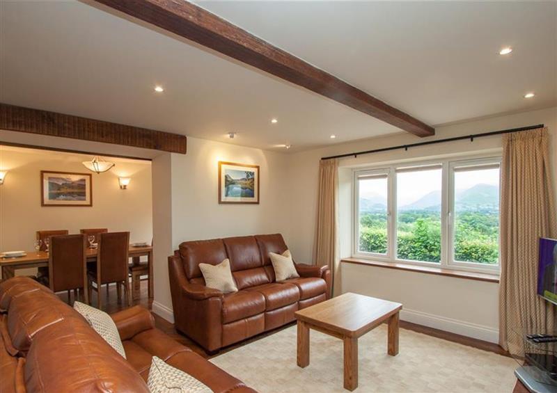 Relax in the living area at Dancing Beck Cottage, Millbeck