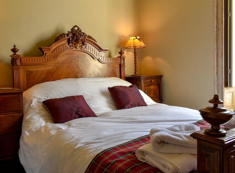Double bedroom with antique French bedroom suite at Darcy House  in Carnforth, Lancashire