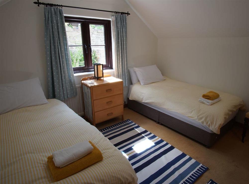 Bedroom 2, set up with 2 standard single beds (photo 2) at Dardy Cottage in Dardy, near Crickhowell, Powys