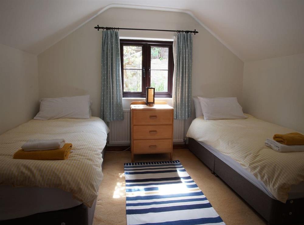 Bedroom 2, set up with 2 standard single beds at Dardy Cottage in Dardy, near Crickhowell, Powys