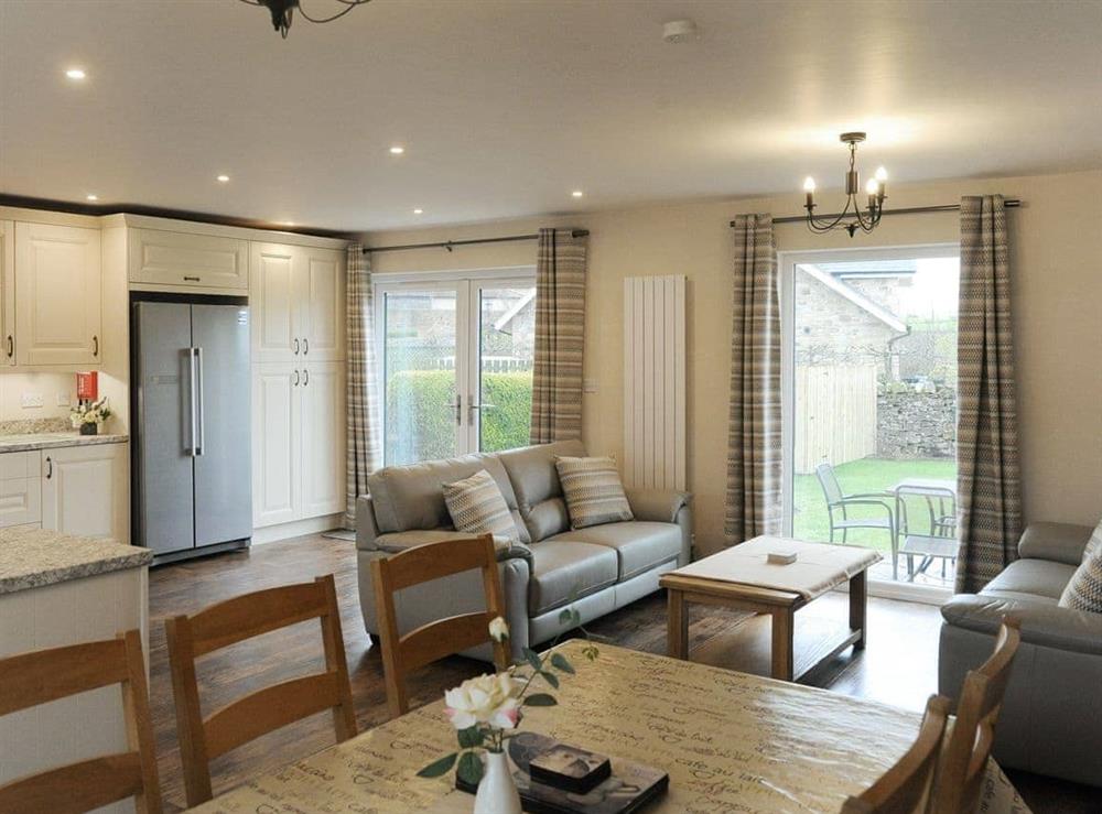 Spacious kitchen/diner with patio door to garden at Darling Cottage in Bamburgh, Northumberland., Great Britain