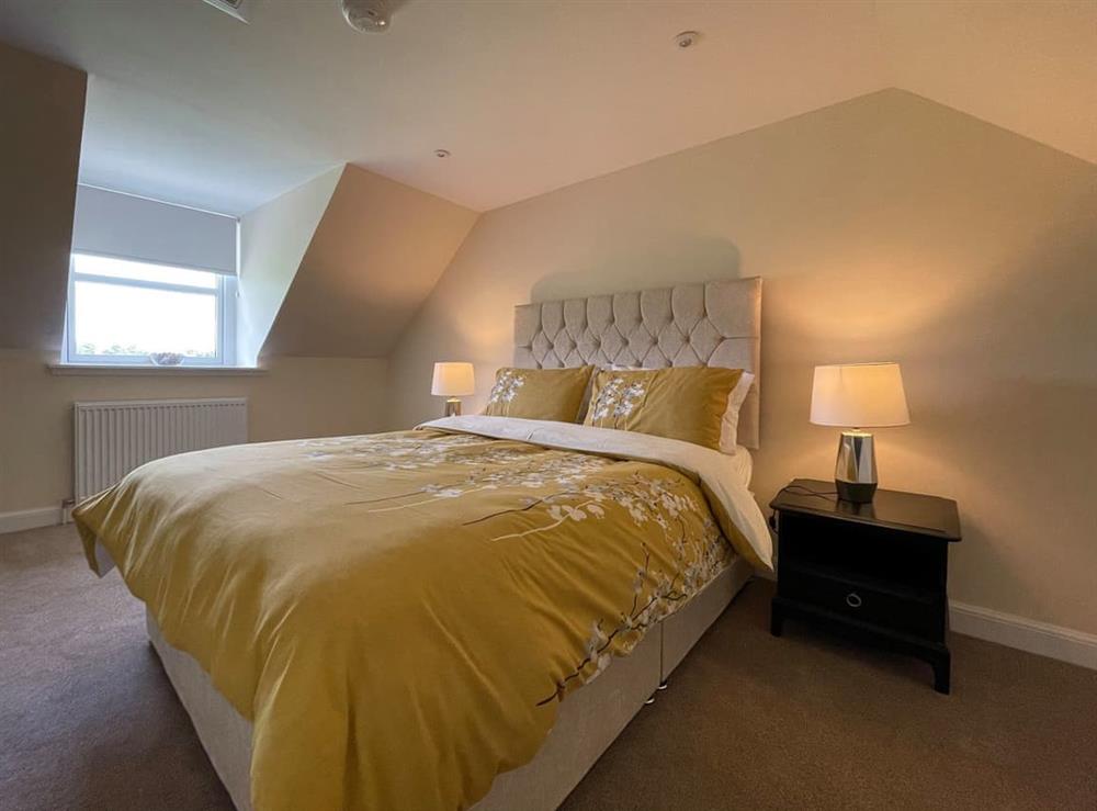 King size bedroom at Darris Farmhouse in Scaniport, Inverness-Shire