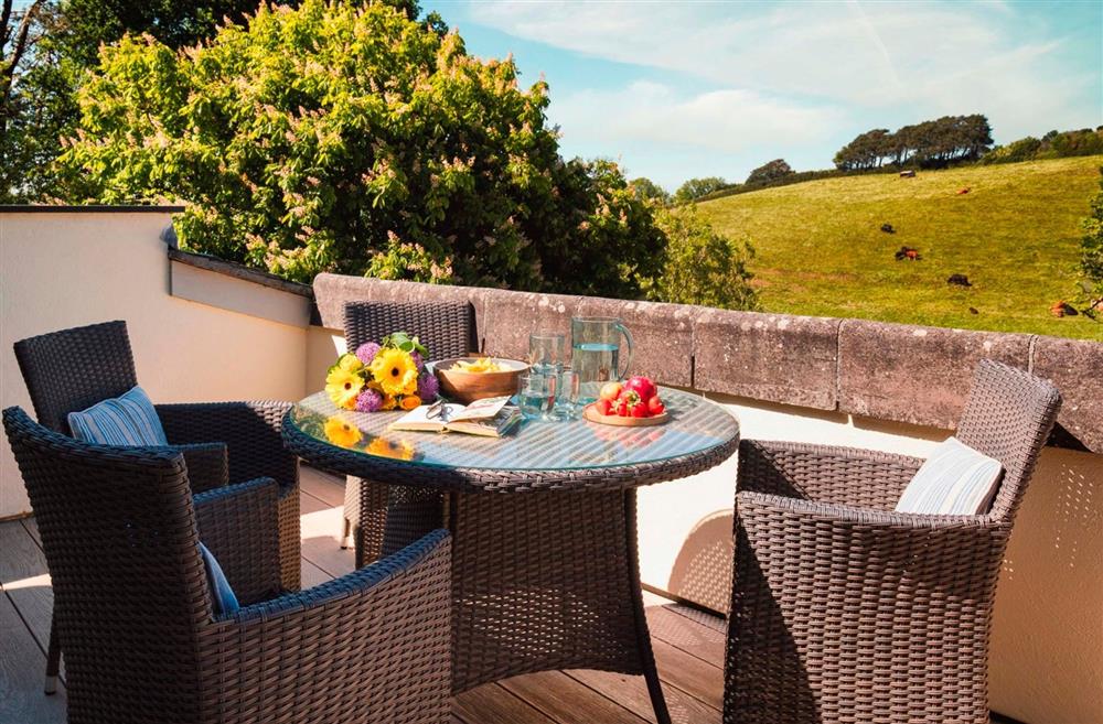 The private patio with an outdoor dining table