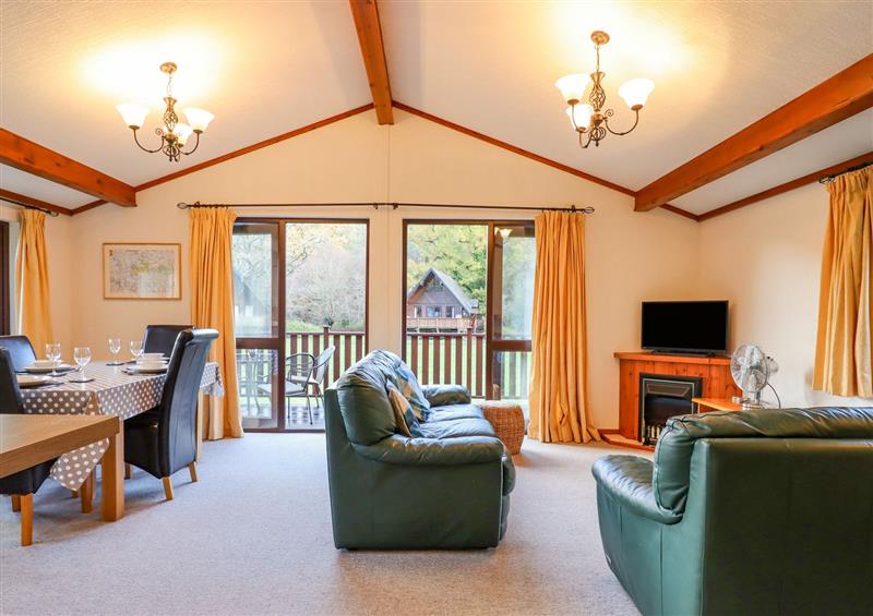 Relax in the living area at Dartmoor Retreat Lodge, Clifford Bridge near Moretonhampstead