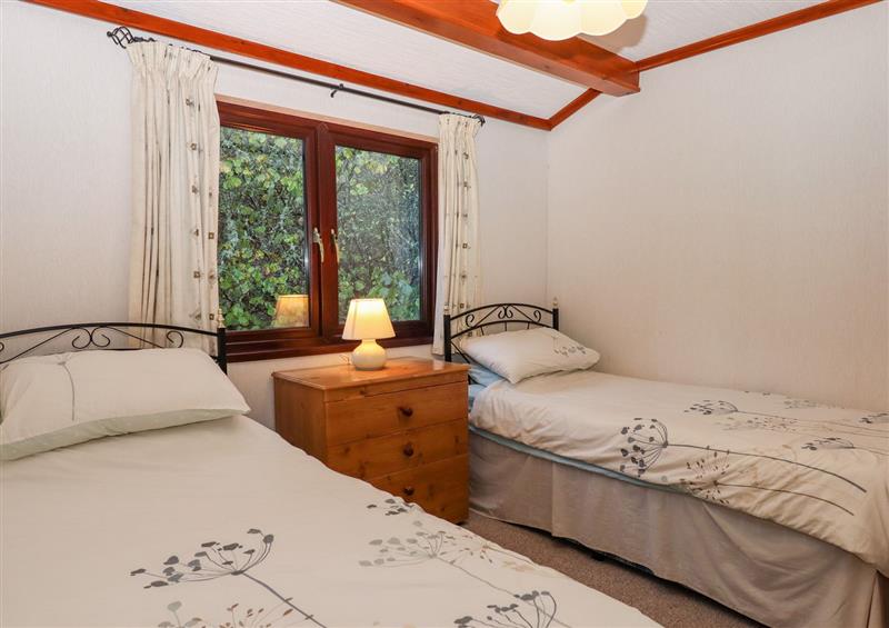 This is a bedroom at Dartmoor Retreat Lodge, Clifford Bridge near Moretonhampstead