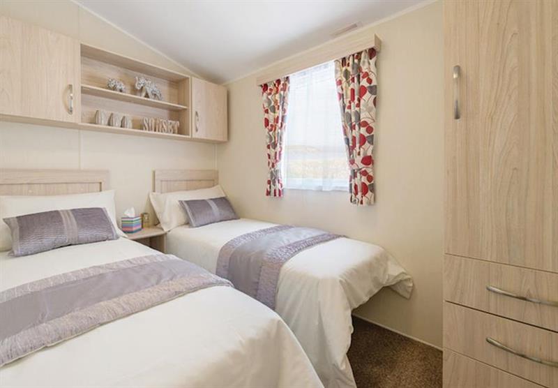 Twin bedroom in a Gold Caravan Four Plus VIP at Dartmoor View in Okehampton, North Devon
