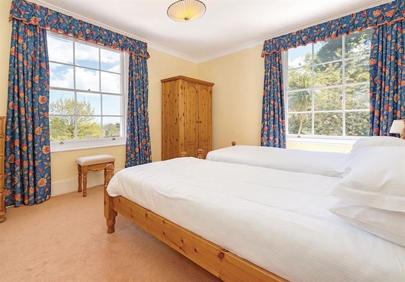 A twin bedroom with views in a typical Woodland View at Dawlish Warren Coastal Retreats in Dawlish, South Devon