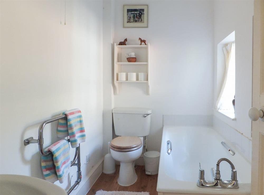 Bathroom with shower attachment at Deer Park Cottage in Norwich, Norfolk