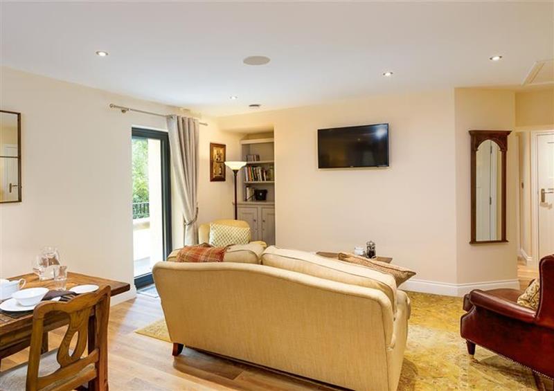 Relax in the living area at Deer Wood at Applethwaite Hall, Windermere