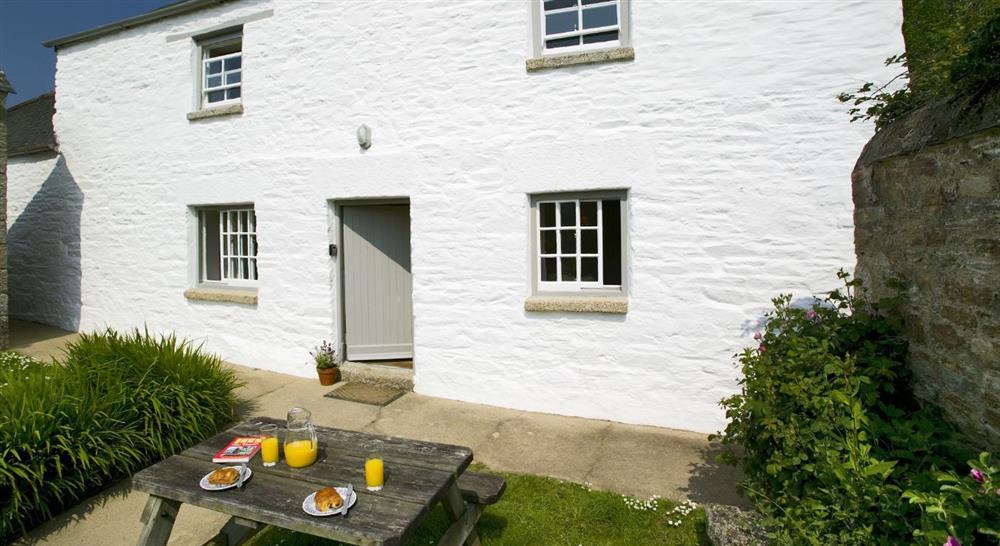 The exterior of Lower Pentire Farm House, Helston, Cornwall at Degibna Lower Pentire Farm House in Helston, Cornwall