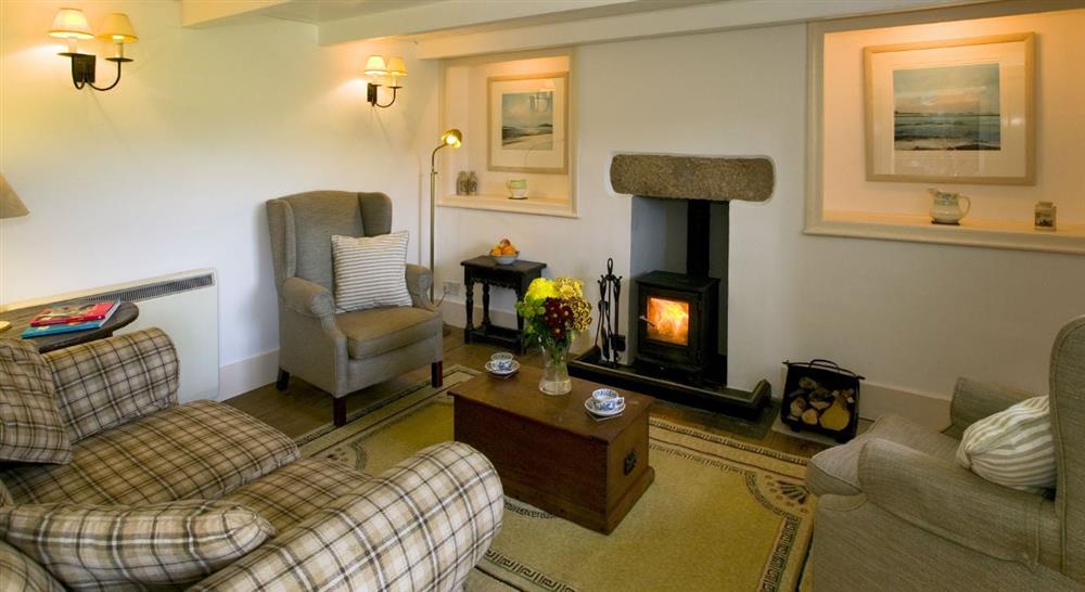 The sitting room at Degibna Lower Pentire Farm House in Helston, Cornwall