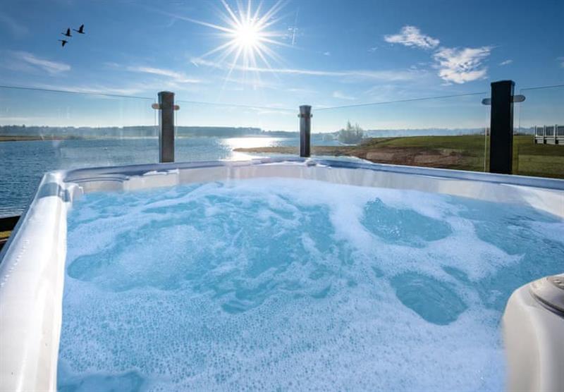Hot tub in the Country Lodge Eight VIP Platinum at Delamere Lake Holiday Park in Delamere Forest, Heart of England