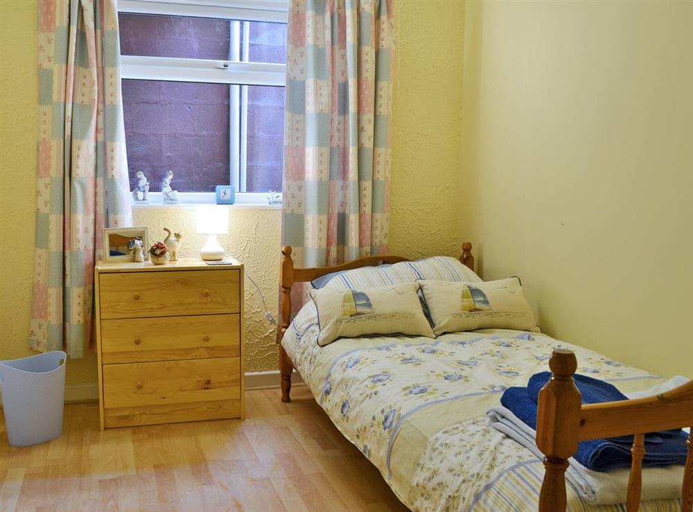 Cosy single bedroom with  en-suite toilet at Delfryn in Talysarn near Caernarfon, Gwynedd