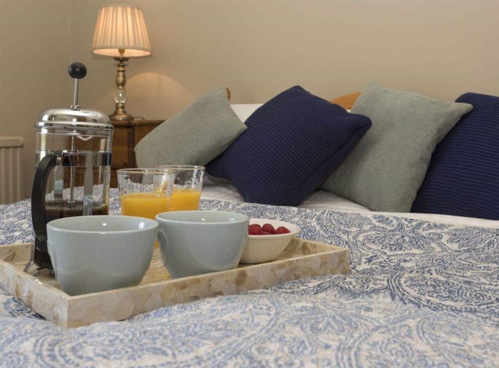 Delightful bedroom with double bed at Dell Cottage in Mundesley, near North Walsham, Norfolk