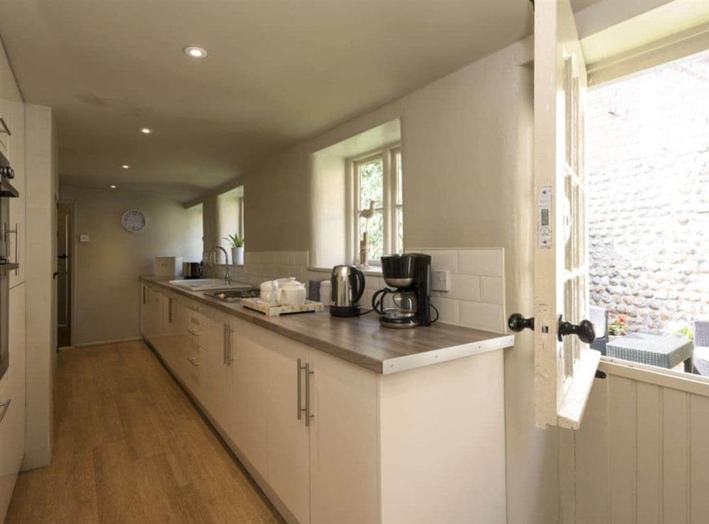 Welcoming kitchen at Dell Cottage in Mundesley, near North Walsham, Norfolk