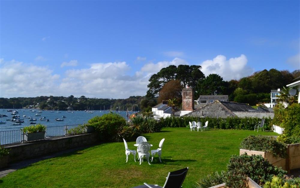 The shared garden with stunning views. at Demelza 1 in Helford Passage