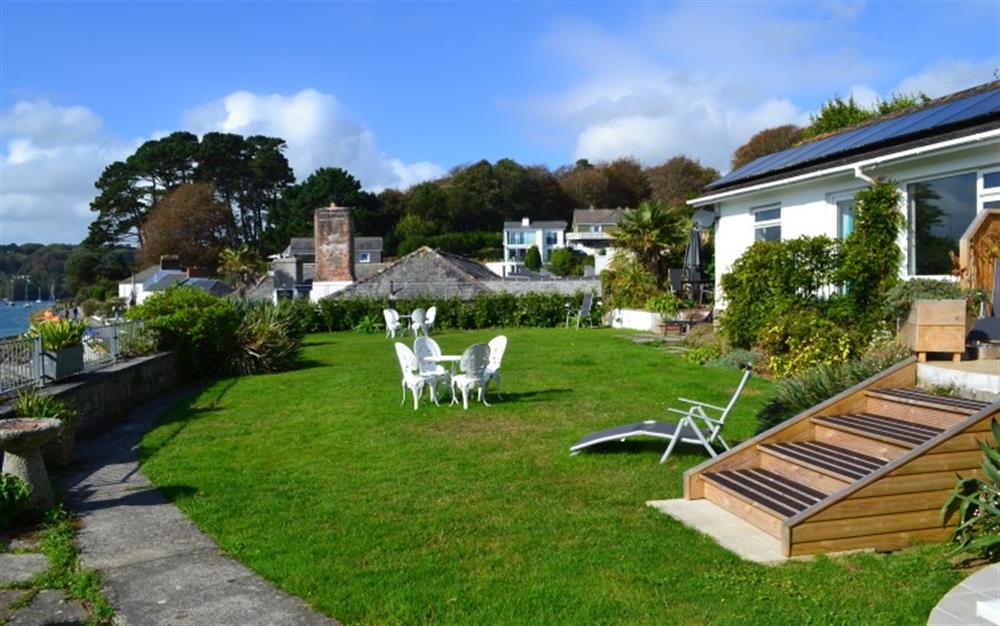 You'll love the shared garden - a perfect playground for your four-legged friend. at Demelza 1 in Helford Passage