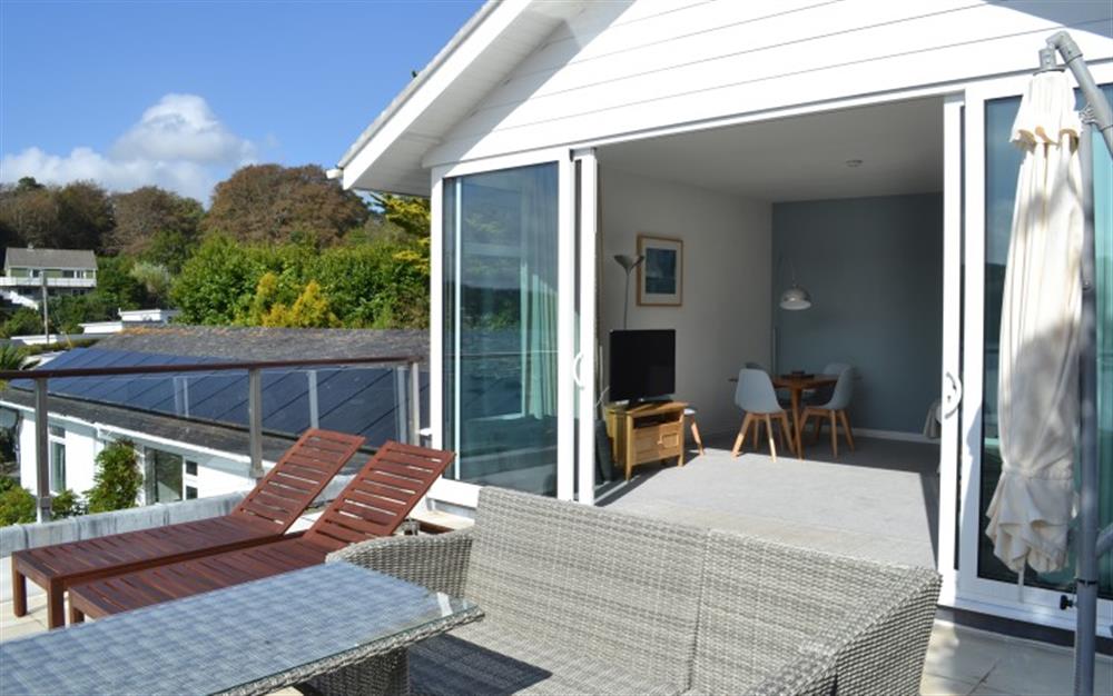 With wide patio doors, the outside area becomes another room. at Demelza 3 in Helford Passage
