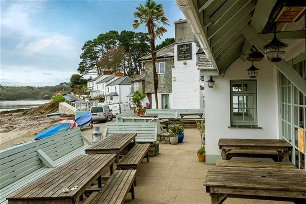 The  outside terrace of the Ferry Boat Inn is a popular spot for a meal or just a drink and some people-watching. at Demelza 4 in Helford Passage