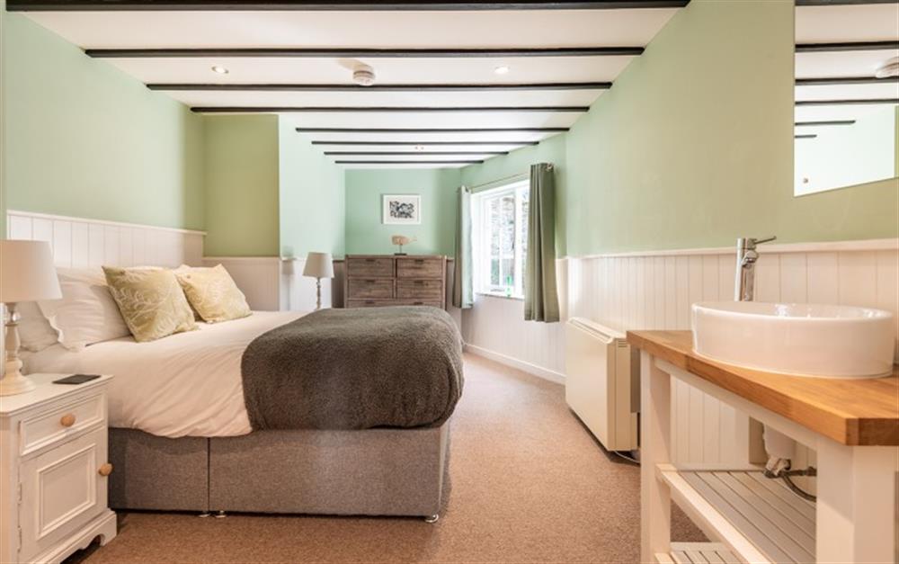 Cosy double bedroom with zip & link beds (can be king upon request) at Dene Cottage in Polperro