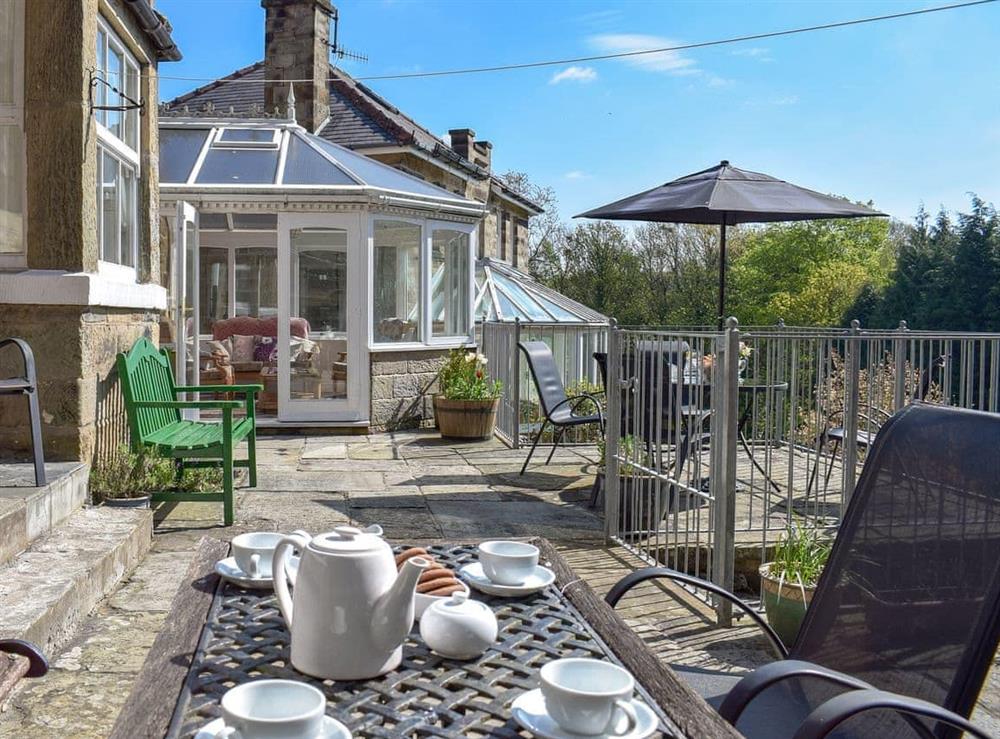 Large terrace area with sitting out furniture at Denham in Glaisdale, North Yorkshire