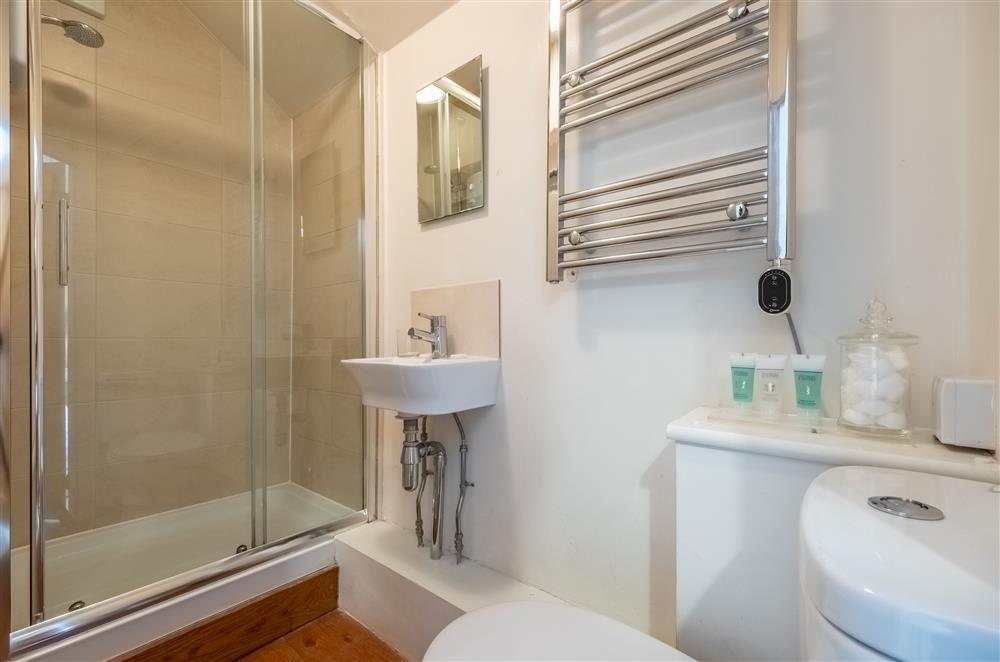 En-suite shower room to bedroom one at Densford Cottage, Amberley