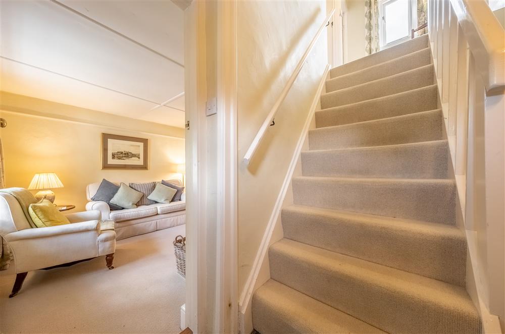 Stairs leading to the first floor bedrooms at Densford Cottage, Amberley
