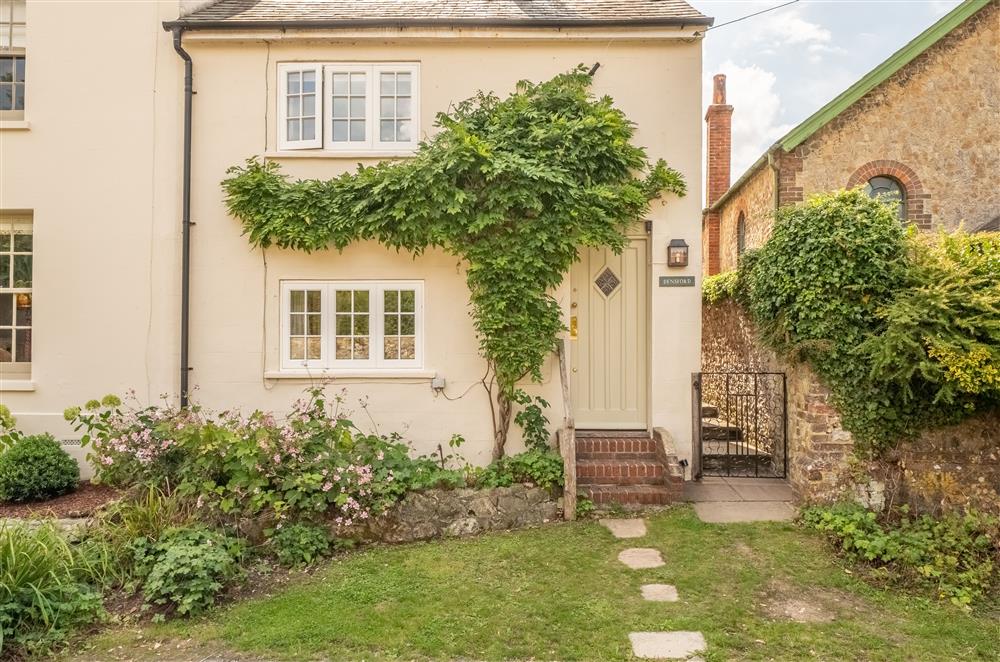 This handsome end-terrace cottage lies in the picturesque village of Amberley, widely regarded as one of the most beautiful villages in England