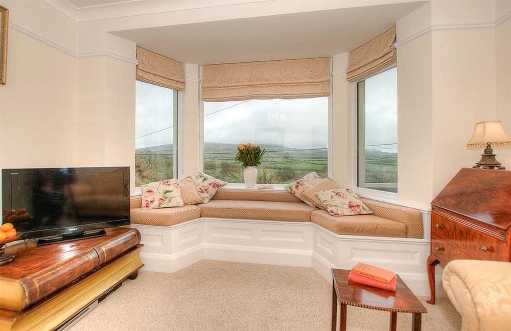Enjoy the living room at Derlwyn in Rhoshirwaun, Pwllheli, Gwynedd