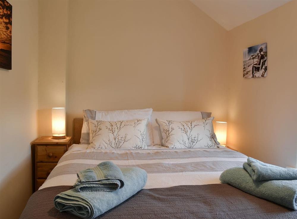Double bedrom with Kingsize bed at Derwent Cottage in Wrench Green, near Scarborough, North Yorkshire