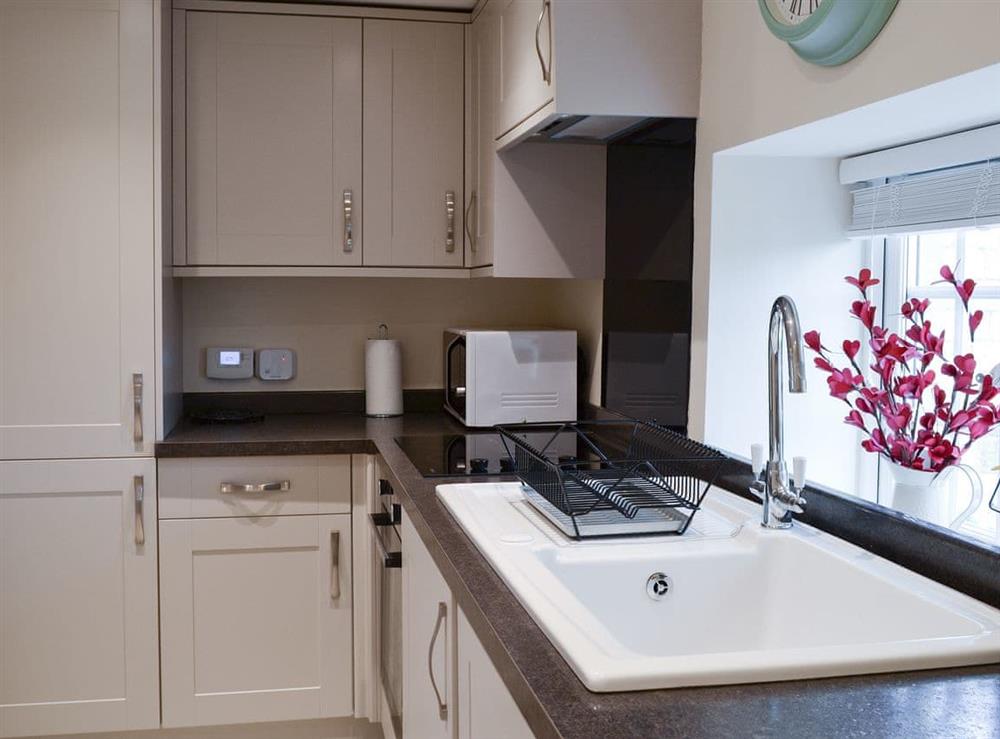 Well equipped kitchen at Derwent Cottage in Wrench Green, near Scarborough, North Yorkshire