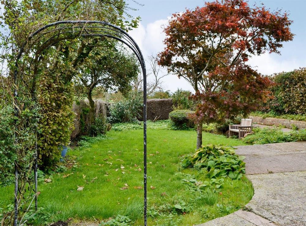 Lawned garden with patio (photo 2) at Derwent View in Setmurthy, near Bassenthwaite, Cumbria