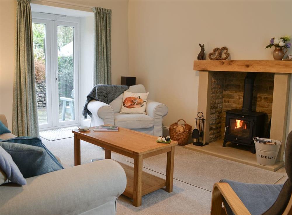 Living room with wood burner at Desmond House in Middleton-In-Teesdale, Durham