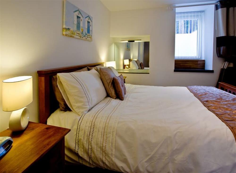 Double bedroom (photo 2) at Devon Villa Garden Apartment in , Torquay