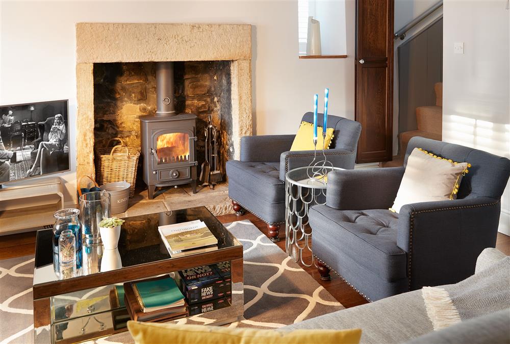 Warm and cosy sitting room, the perfect place to relax after a long walk at Devonshire Cottage, Chatsworth Estate , Beeley 