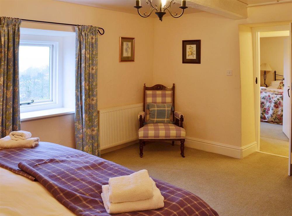 This romantic comfortable bedroom has lots of space at Dewsnaps Frost in Chinley, Nr Chapel-en-le-Frith., Derbyshire