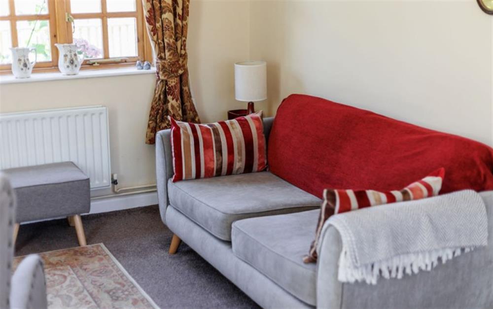 Relax in the living area at Dial Cottage in Bransgore
